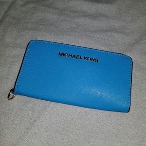 Michael Kors blue wallet with phone case